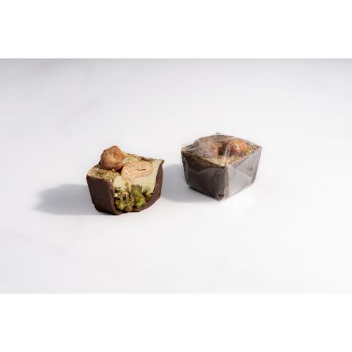 Bousheyeh Madlouqa - White Cream with Pitsachio and Cashew in Milk Chocolate